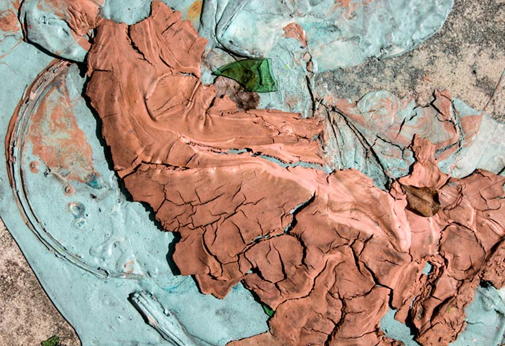 street photographer finds abstraction on urban sidewalk